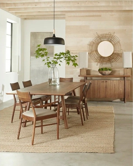 Walnut Grove Credenza in decorated dining room with table, chairs, and rug