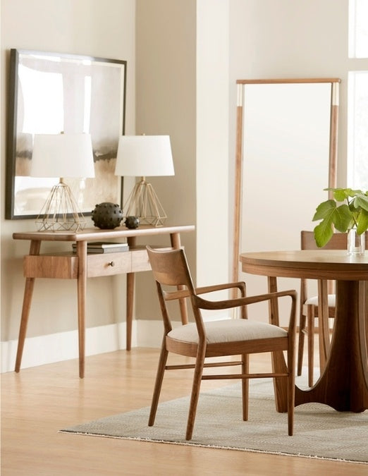Walnut Grove Console in dining room with table, chairs, mirror, and rug