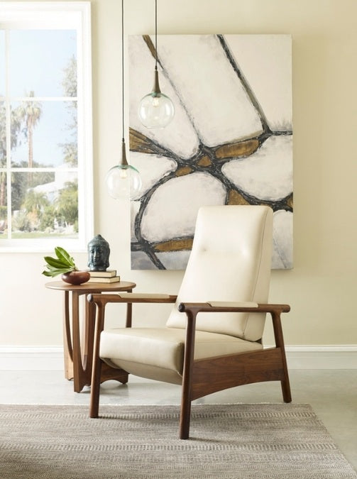 Walnut Grove Drink Table next to chair with decor and rug