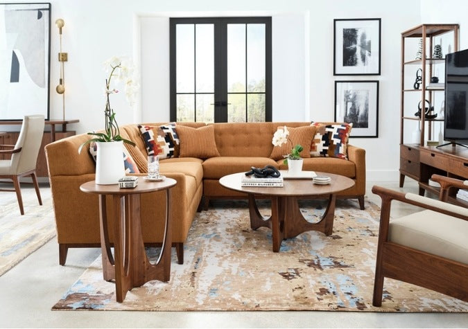 Walnut Grove Drink Table in decorated living room with round cocktail table, sectional, and rug