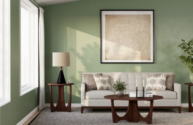 Walnut Grove Drink Table in decorated living room with round cocktail table, sofa, and rug