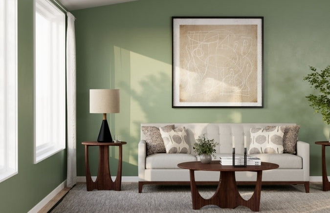 Walnut Grove Round Cocktail Table in decorated living room with lamp table, sofa, and rug.
