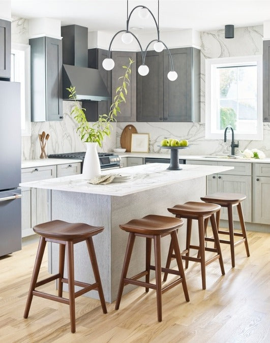 Walnut Grove Counter Stool surrounding island in decorated kitchen
