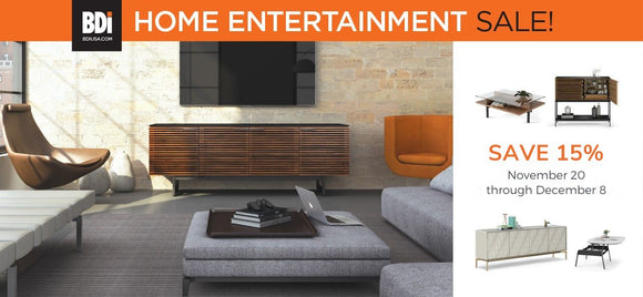 Advertisement for BDI home entertainment sale with furniture and TV setup.