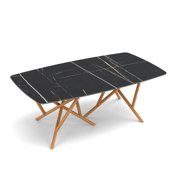 Baton Boat Shaped Stone Top Table in Sahara Noir with Natural Cherry base top view