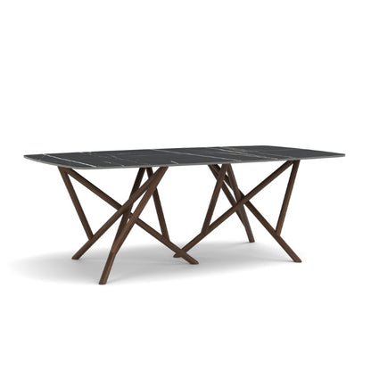 Baton Boat Shaped Stone Top Table in Sahara Noir with Natural Walnut base angled view