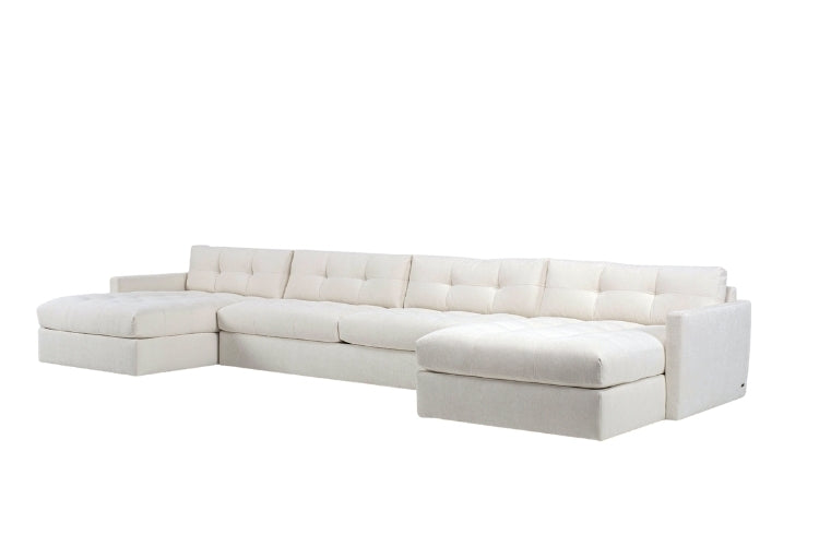 Carmet Elements Sectional in white with tufted cushion angled view
