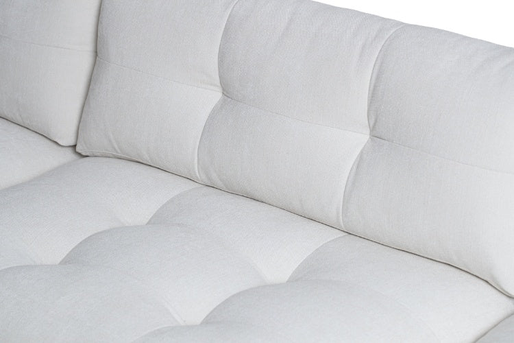 Carmet Elements Sectional in white with tufted cushion close up view of cushions