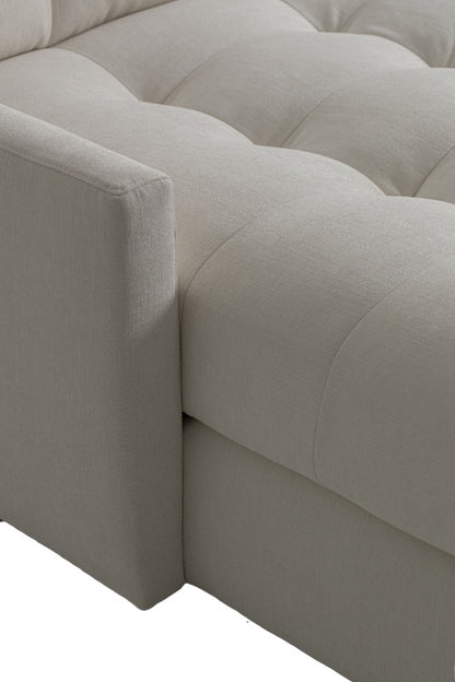 Carmet Elements Sectional in white with tufted cushion close up view of edge of cushion