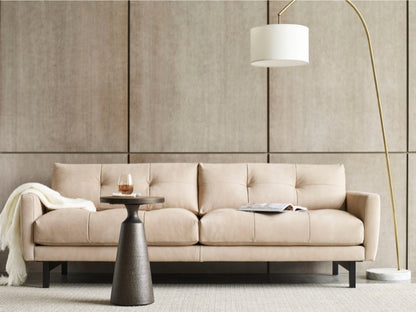 Carmet Elements Sofa high leg in decorated room with lamp, table, and blanket