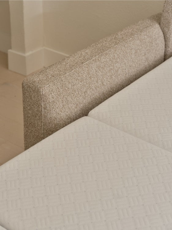 Close-up of a textured beige sofa 