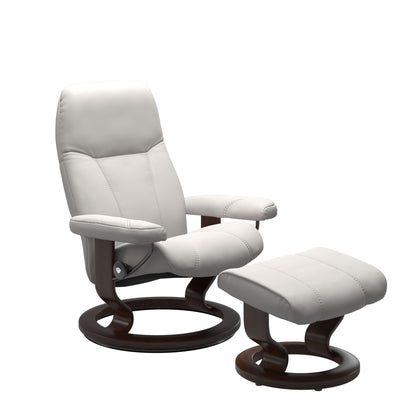 Front view of Stressless Consul Small Recliner and Ottoman in Batick Milky White with Classic Base in brown