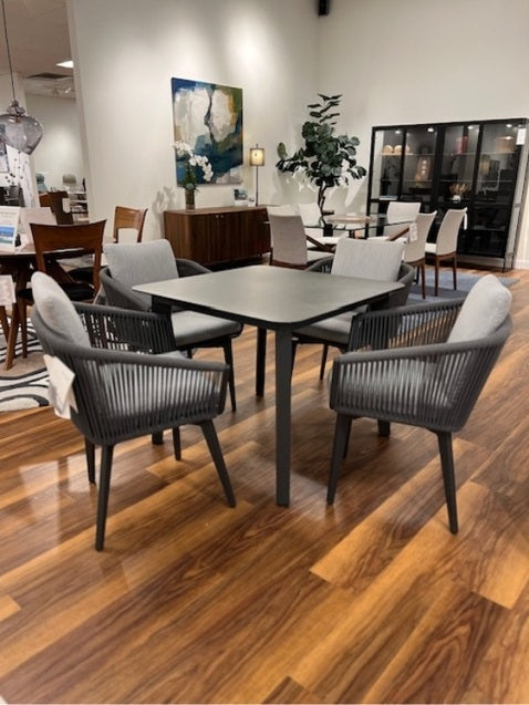 Dining Table by Couture Jardin is featured in Charcoal Ceramic with 4 Indoor/Outdoor Chairs.