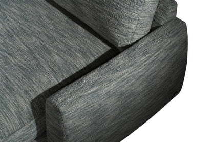 Gray fabric sofa with a focus on texture and pattern