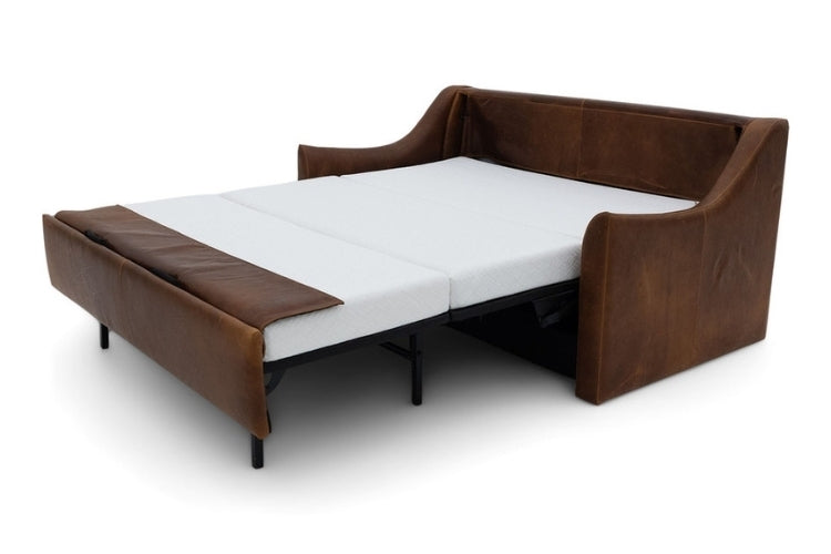 Brown leather sectional sofa bed pulled out to full size showing white mattress. 