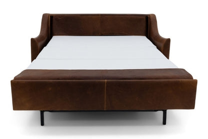Brown leather sectional sofa bed pulled out to full size showing white mattress. 