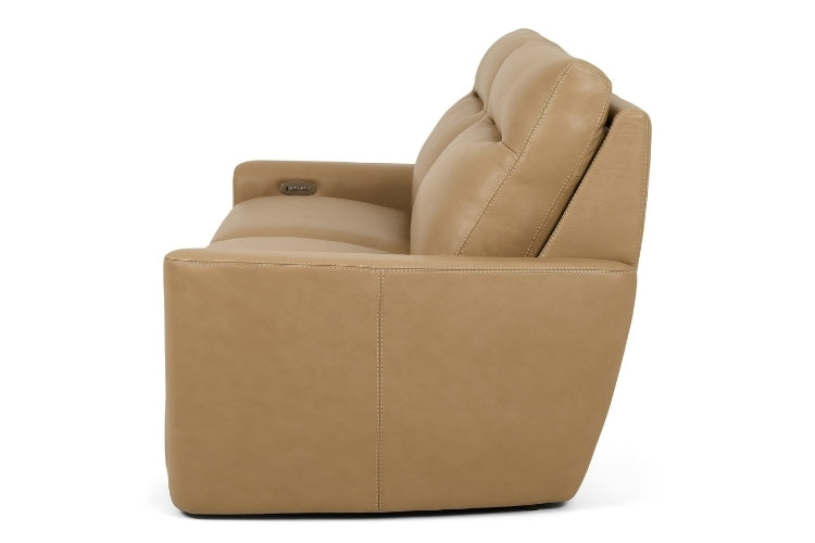 Tan leather sofa on a white background