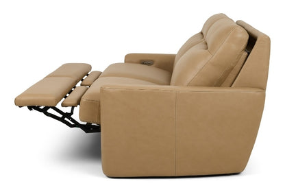 Tan reclining sofa on a white background