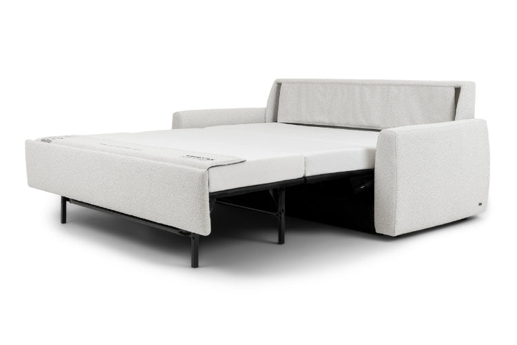 Gray sofa bed  pulled out in bed position