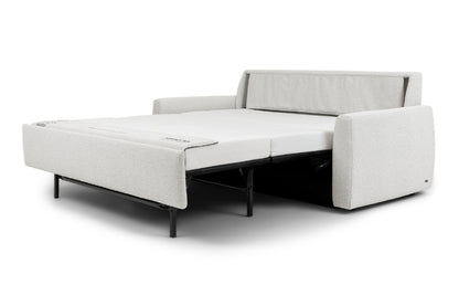 Gray sofa bed  pulled out in bed position