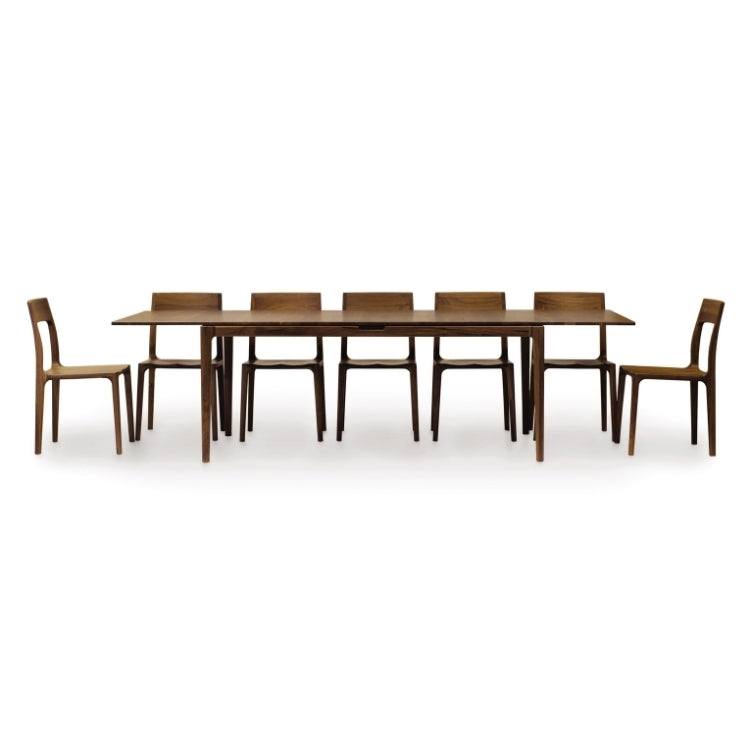 Lisse Extension Table extended with 7 Lisse Chairs