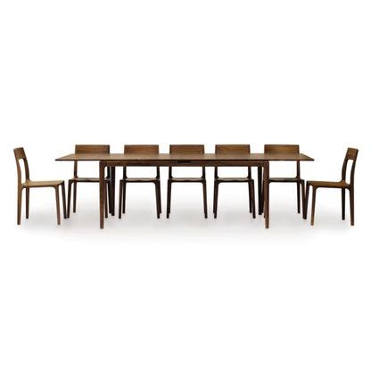 Lisse Extension Table extended with 7 Lisse Chairs