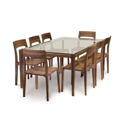 Lisse Glass Top Table angle view with 8 Lisse Chairs