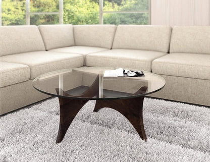 Pivot Round Glass Top Coffee Table in living room with sectional and plush rug