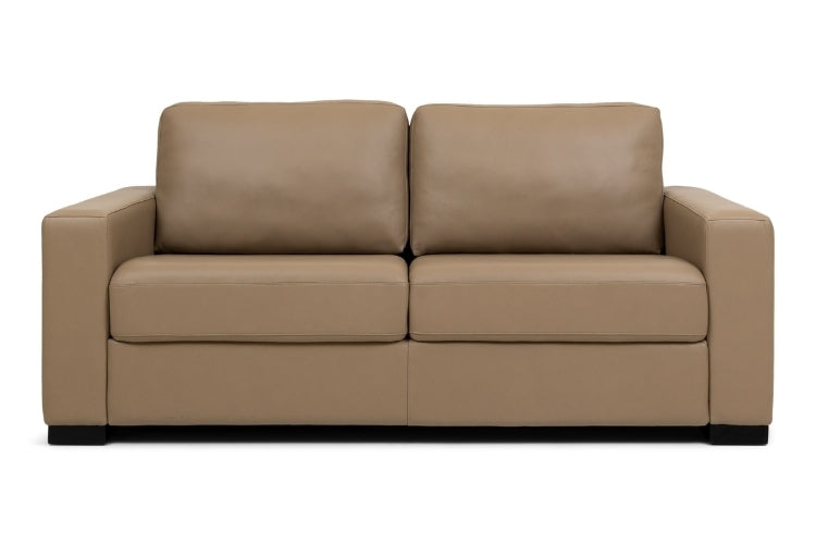Tan leather 2 seat sofa with plush pillows 