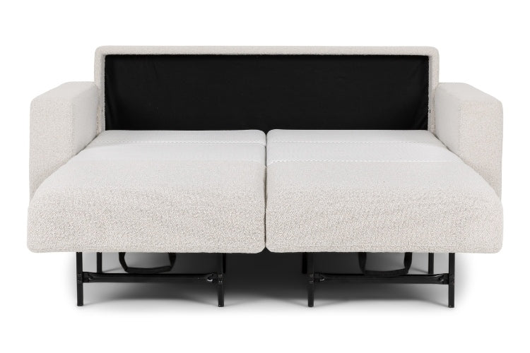 Beige sectional sofa bed pulled out to full size showing white mattress. 
