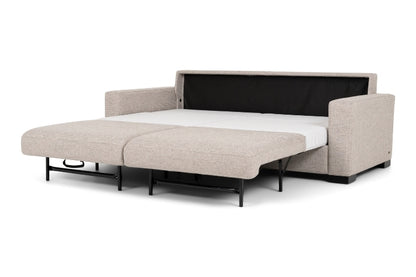Beige fabric sectional sofa bed pulled out to full size showing white mattress. 