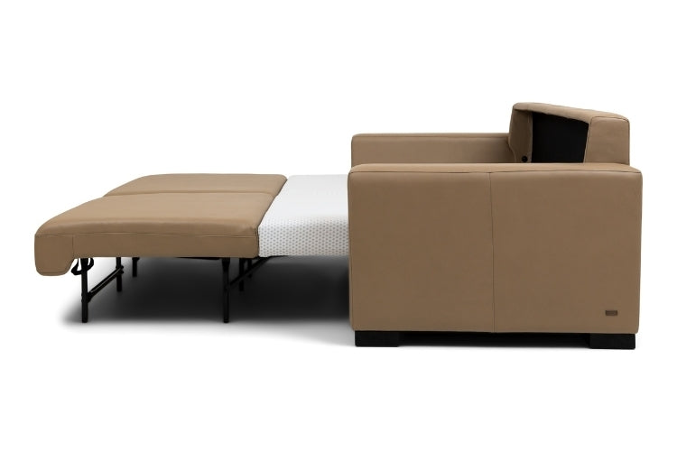Brown sectional sofa bed pulled out to full size showing white mattress. 