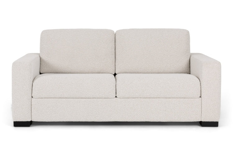 Beige 2 seat sofa on a white background