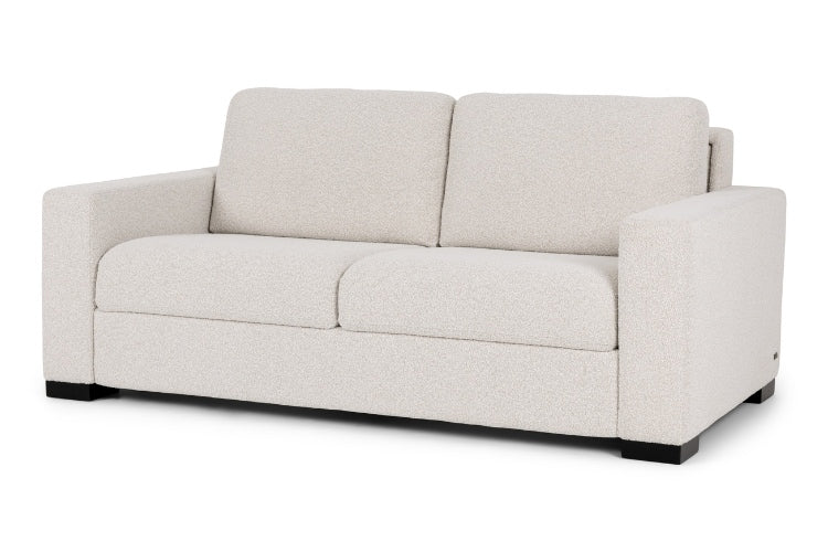 Beige sofa on a white background