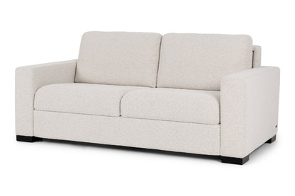 Beige sofa on a white background