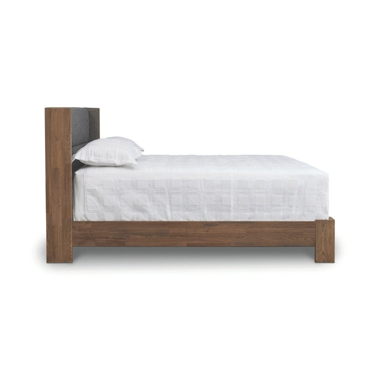 Sloane Bed with Legs in walnut and Grade B Slate fabric upholstery side view