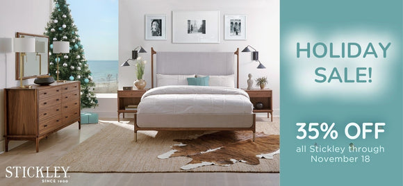 Advertisement for Stickley furniture with a bedroom set and Christmas tree, featuring a holiday sale promotion.