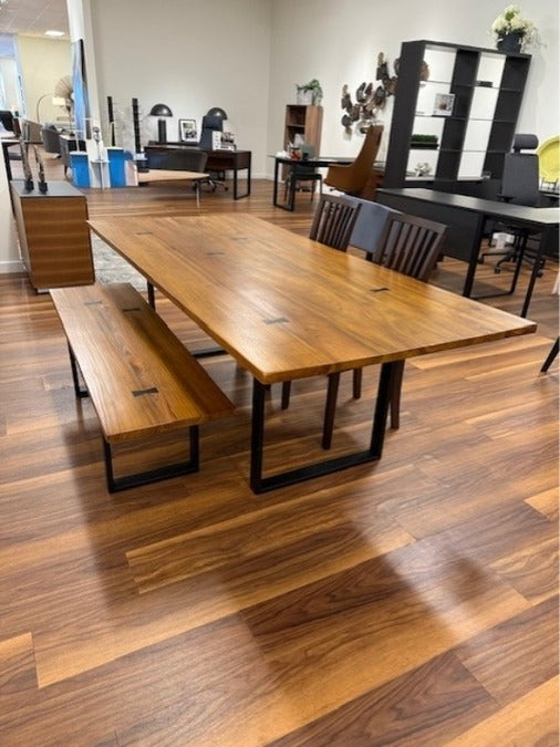 Elements Stowe wooden Dining Table in store with bench and 2 chairs.