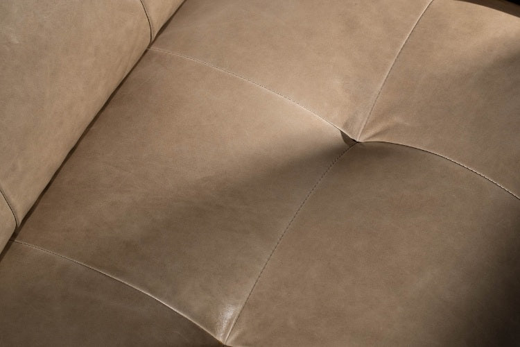 Close-up of a brown leather sofa