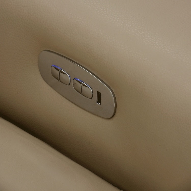 Close-up of a metallic control panel on reclining seats