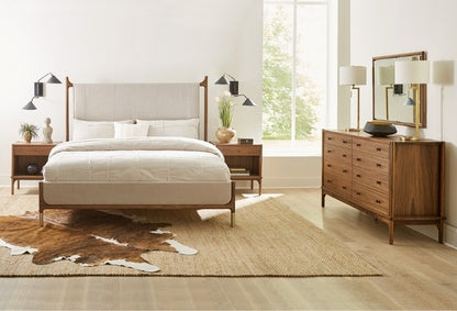 Walnut Grove Upholstered Bed in decorated bedroom with nightstands, dresser, and rug