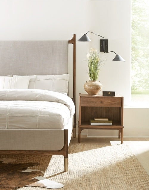 Walnut Grove Upholstered Bed close up with nightstand