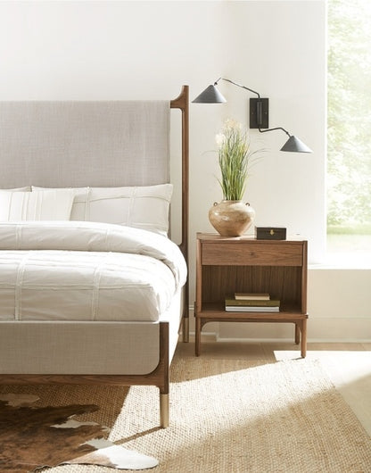 Walnut Grove Upholstered Bed close up with nightstand