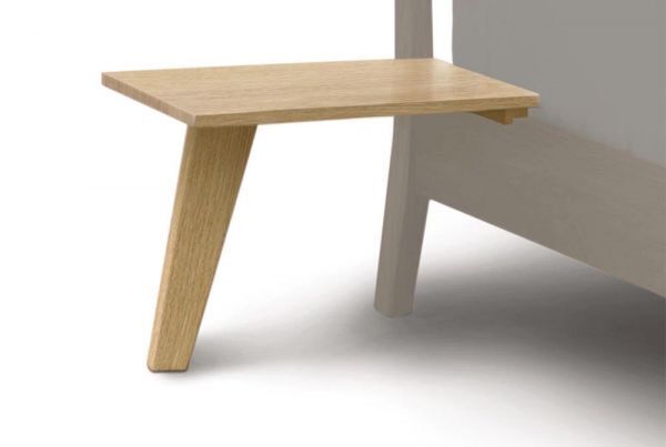 Oak wooden floating nightstand with one angled leg.