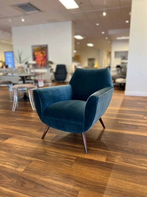 Navy blue Finnegan Chair Marine by Precedent in showroom setting