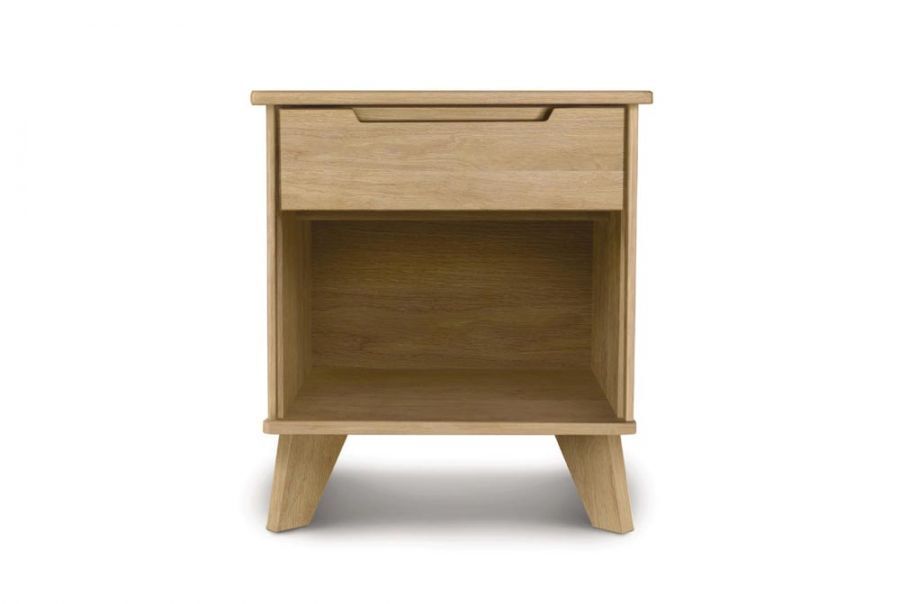 Wooden oak nightstand with one drawer, an open shelf, recessed handle and angled legs.