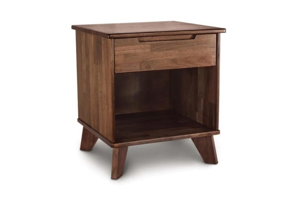 Wooden walnut  nightstand with one drawer, an open shelf, recessed handle and angled legs.