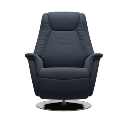 Paloma blue recliner chair with padded cushions and round metal base 