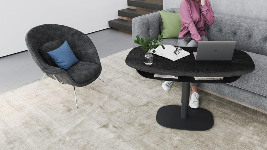 Soma 1130 in Ebonized Ash with laptop and chair next to it