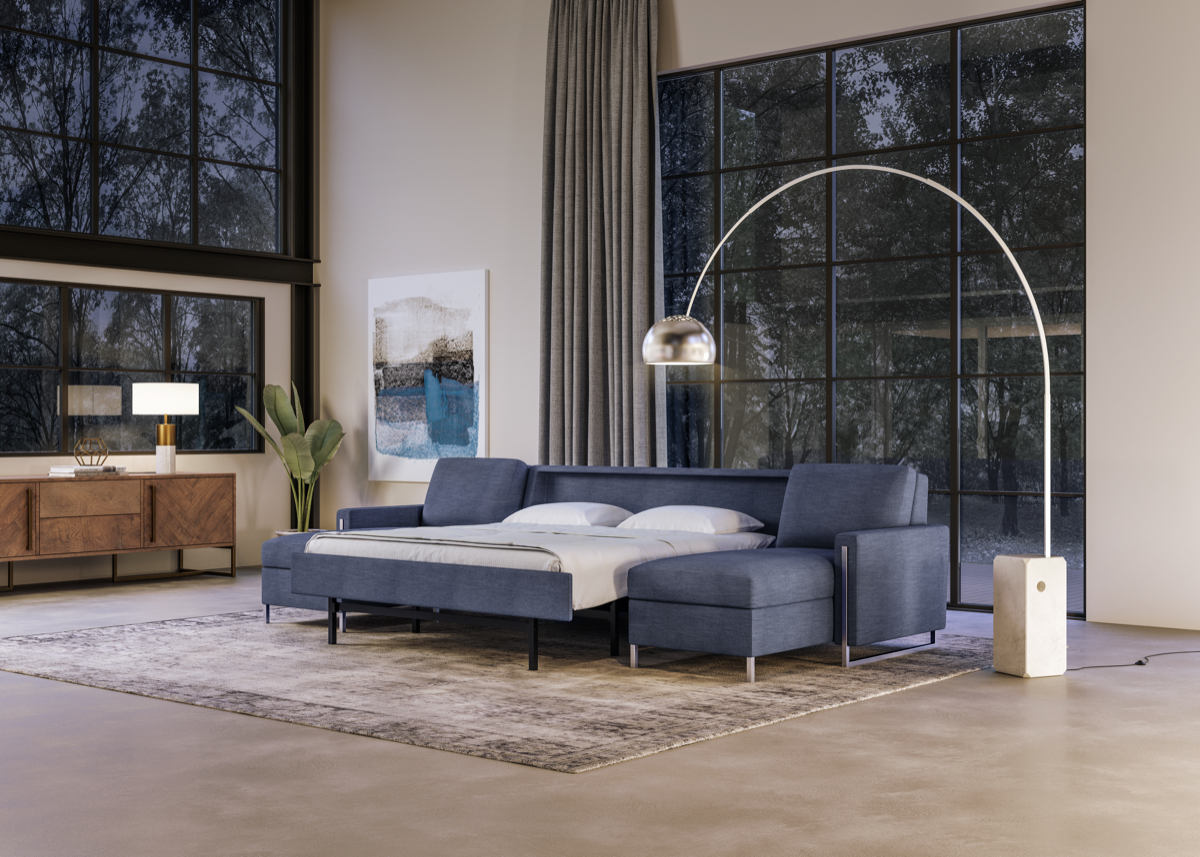 Sulley Leather Comfort Sleeper open into sleeping postion in living room dark navy blue color.